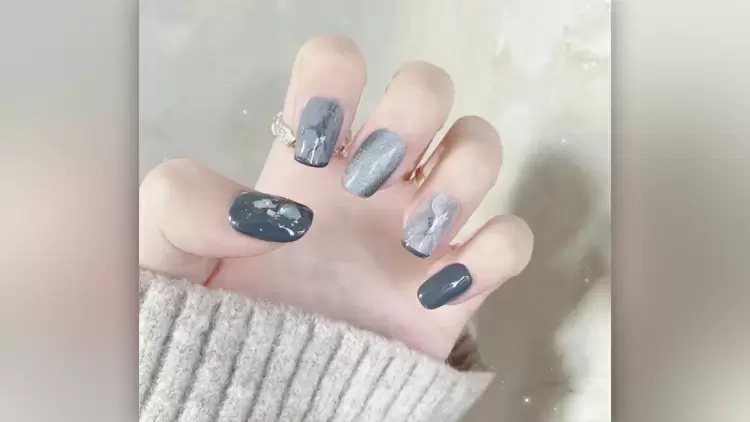 Experience the freshness of marble-like textures with these manicures. 