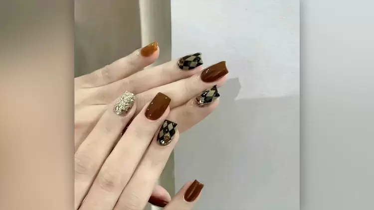 Classic plaid patterns and harmonious color matching define these manicures. 