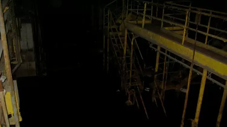 Facing a dark, gloomy corner, you: