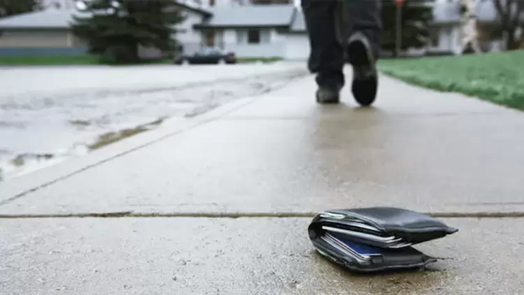 If you find a wallet with a large amount of cash on a deserted street, what would you do?